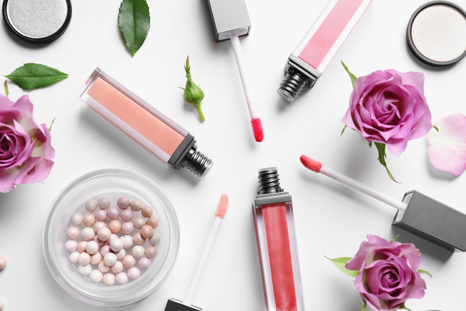 Photo of beautiful composition with lipsticks on white background, flat lay