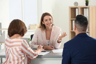 Human resources manager conducting job interview with applicants in office
