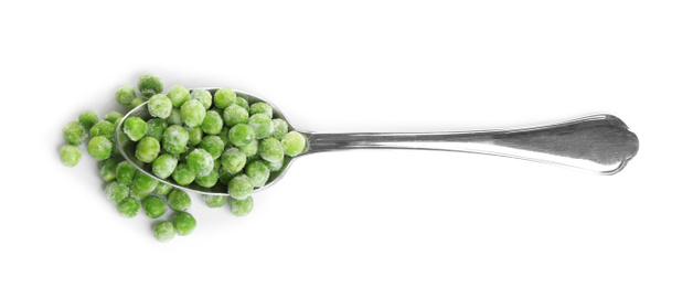 Frozen peas in spoon isolated on white, top view. Vegetable preservation