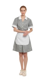 Full length portrait of chambermaid in tidy uniform on white background