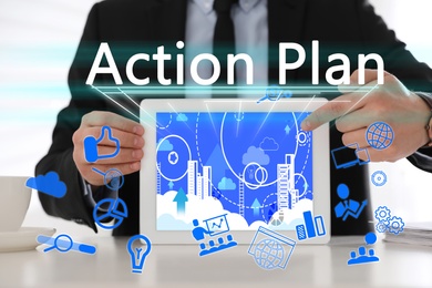 Action plan. Different icons on virtual screen and man holding tablet, closeup 