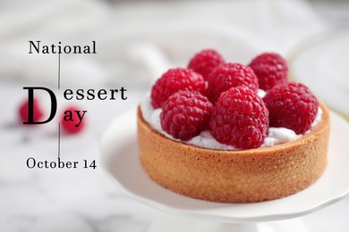 National Dessert Day, October 14. Cake stand with tasty raspberry tartlet, closeup