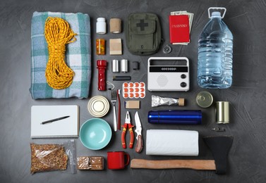 Disaster supply kit for earthquake on dark grey table