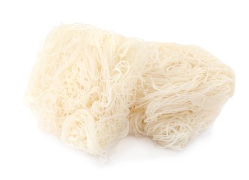 Photo of Bricks of dried rice noodles isolated on white. East Asian cuisine