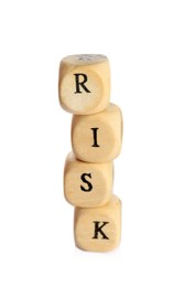 Stack of wooden cubes with word Risk isolated on white