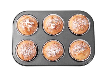Photo of Tasty homemade muffins powdered with sugar in tray on white background, top view
