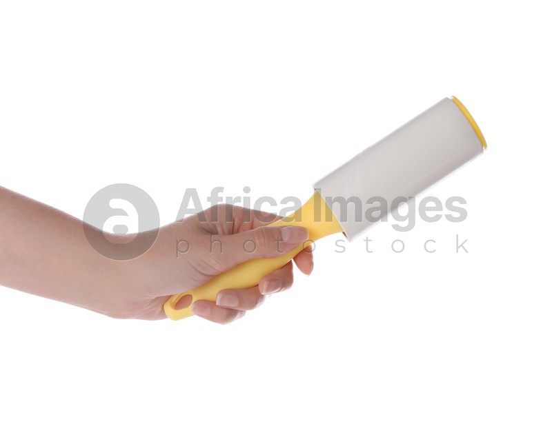 Photo of Woman holding lint roller on white background, closeup