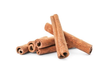 Aromatic cinnamon sticks on white background