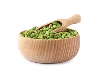 Wooden bowl and scoop with dry cardamom seeds isolated on white