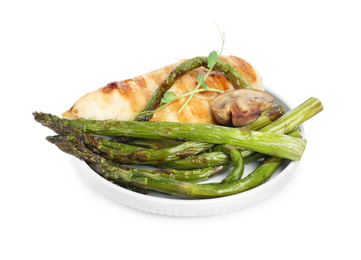 Tasty grilled chicken fillet with asparagus and mushroom isolated on white