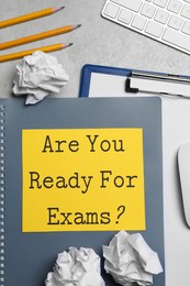 Sheet of paper with question Are You Ready For Exams? on grey table, flat lay