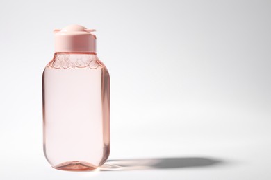 Bottle of micellar water on white background. Space for text