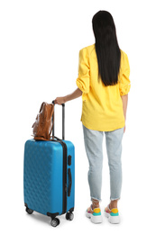 Beautiful woman with suitcase for summer trip on white background, back view. Vacation travel