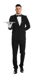 Elegant butler holding silver tray isolated on white