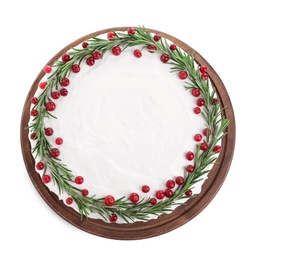Traditional Christmas cake decorated with rosemary and cranberries isolated on white, top view