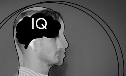  Illustrated head with brain and blurred view of man on grey background. IQ test