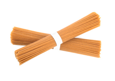 Uncooked buckwheat noodles isolated on white. Japanese cuisine