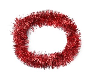 Shiny red tinsel isolated on white, top view