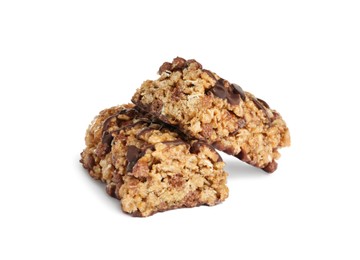 Halves of tasty protein bar with granola on white background
