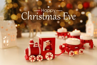 Happy Christmas Eve, postcard design. Red toy train as candle holder on white table in room