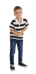 Little boy suffering from stomach ache on white background