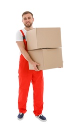 Young worker carrying boxes isolated on white. Moving service