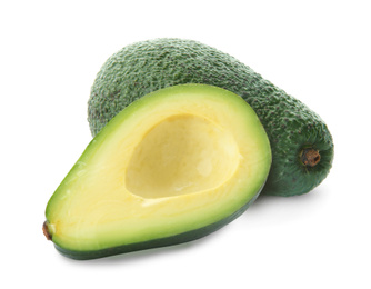 Cut and whole fresh avocados on white background