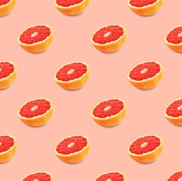 Many fresh ripe grapefruits on pink background. Seamless pattern design