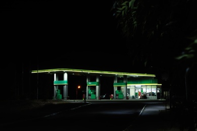 View of modern gas station at night outdoors