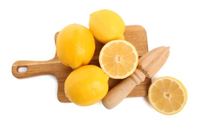 Wooden juicer and fresh lemons on white background, top view