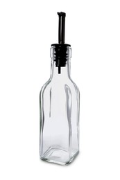 Empty glass bottle with pump for oil on white background