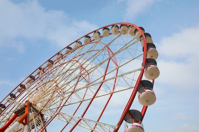 Beautiful large Ferris wheel outdoors, low angle view