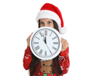 Girl in Santa hat with clock on white background. New Year countdown