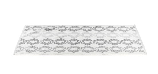New bath mat with beautiful pattern isolated on white