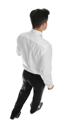 Photo of Businessman in formal clothes on white background, back view