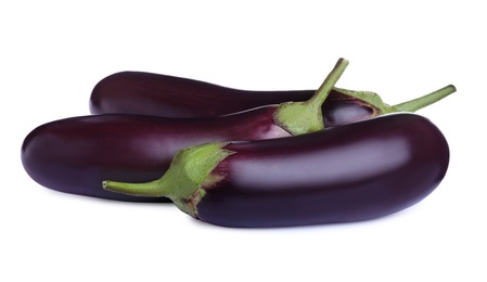 Photo of Organic fresh ripe eggplants on white background