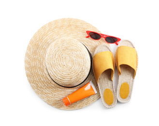 Composition with beach objects on white background, top view