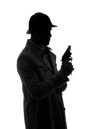 Photo of Old fashioned detective with revolver on white background