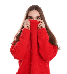 Beautiful young woman in red sweater on white background. Winter season