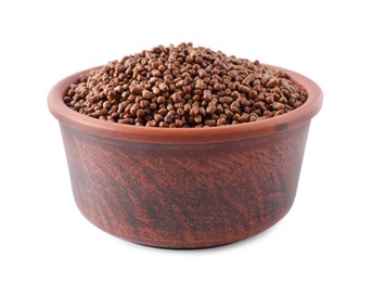 Photo of Buckwheat tea granules in bowl on white background