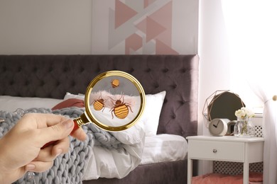 Woman with magnifying glass detecting bed bugs in bedroom, closeup