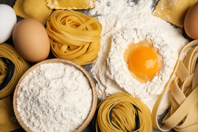 Different types of pasta and ingredients, top view