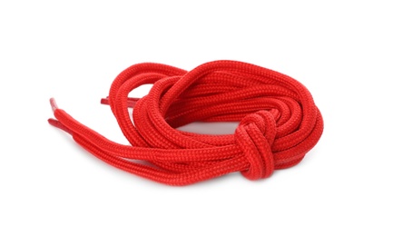 Red shoe laces tied in knot isolated on white