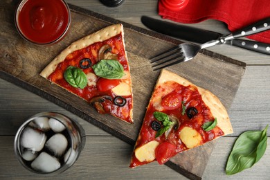 Slices of delicious pita pizza and cold drink on wooden table, flat lay