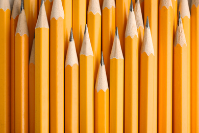 Many graphite pencils as background, top view