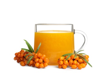 Sea buckthorn tea and fresh berries isolated on white