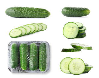 Set with whole and sliced cucumbers on white background