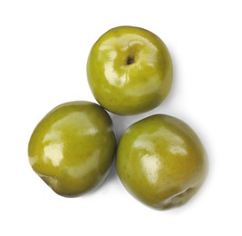 Three fresh green olives on white background, top view