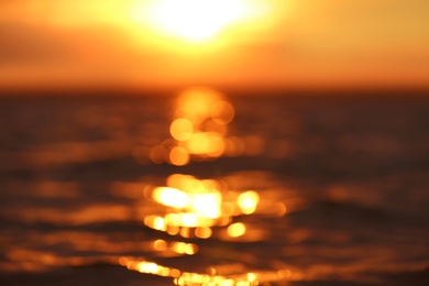 Blurred view of sea and sky at sunset