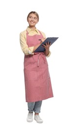 Beautiful young woman in clean striped apron with clipboard on white background
